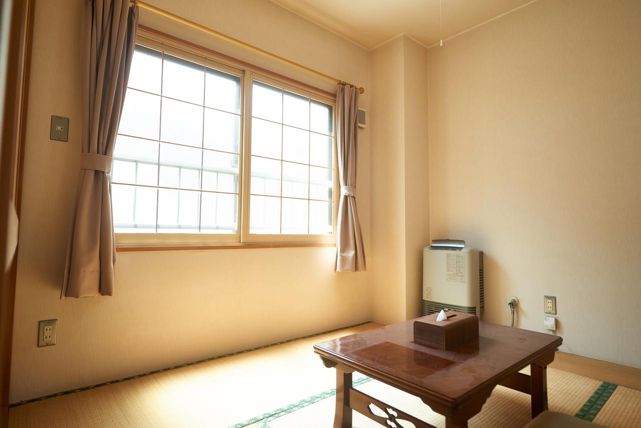 Готель Sounkyo Onsen Kumoi Камікава Номер фото